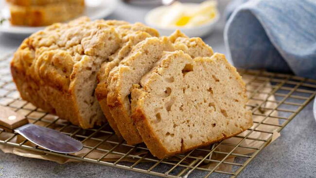 Beer bread on a cooling rack served with butter