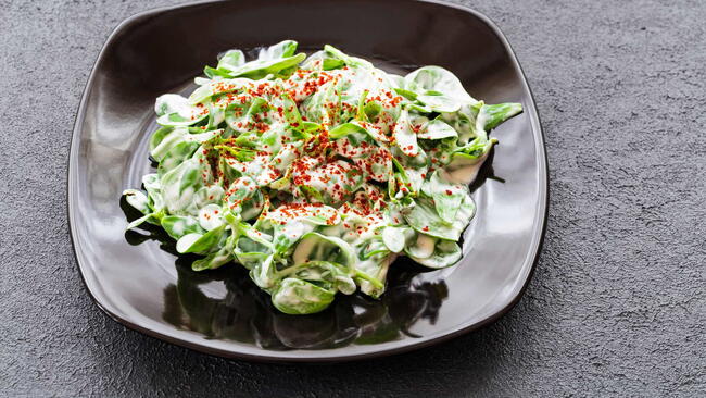 Purslane salad is a type of salad. Purslane salad is a healthy food source. It is a type of salad used in diets.